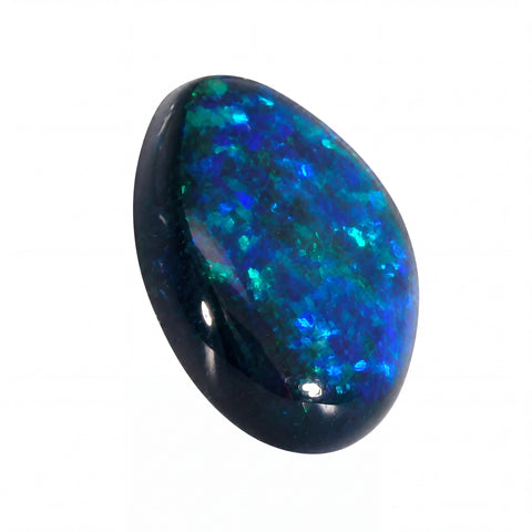 Oval-shaped opal gemstone with blue and green fluorescence on a white background