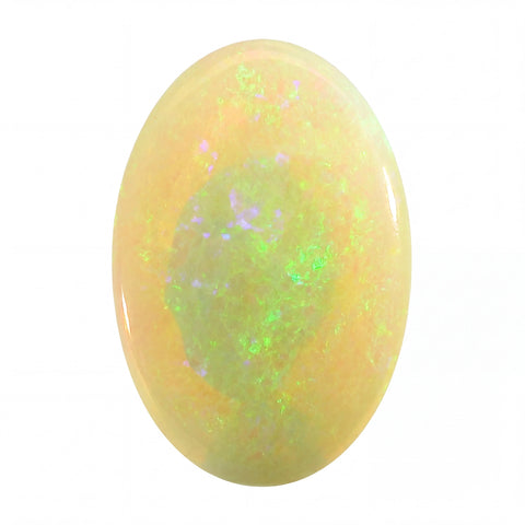 Opal stone with green and purple play of colour on a white background