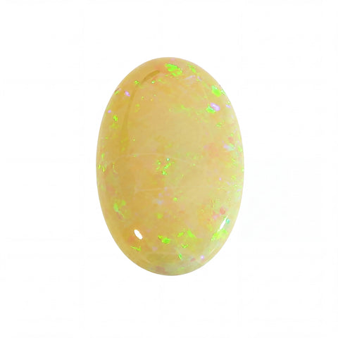 Oval-shaped opal stone with green and pink speckles on a white background