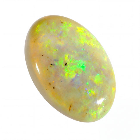 Opal stone with vibrant green and yellow fluorescence on a white background