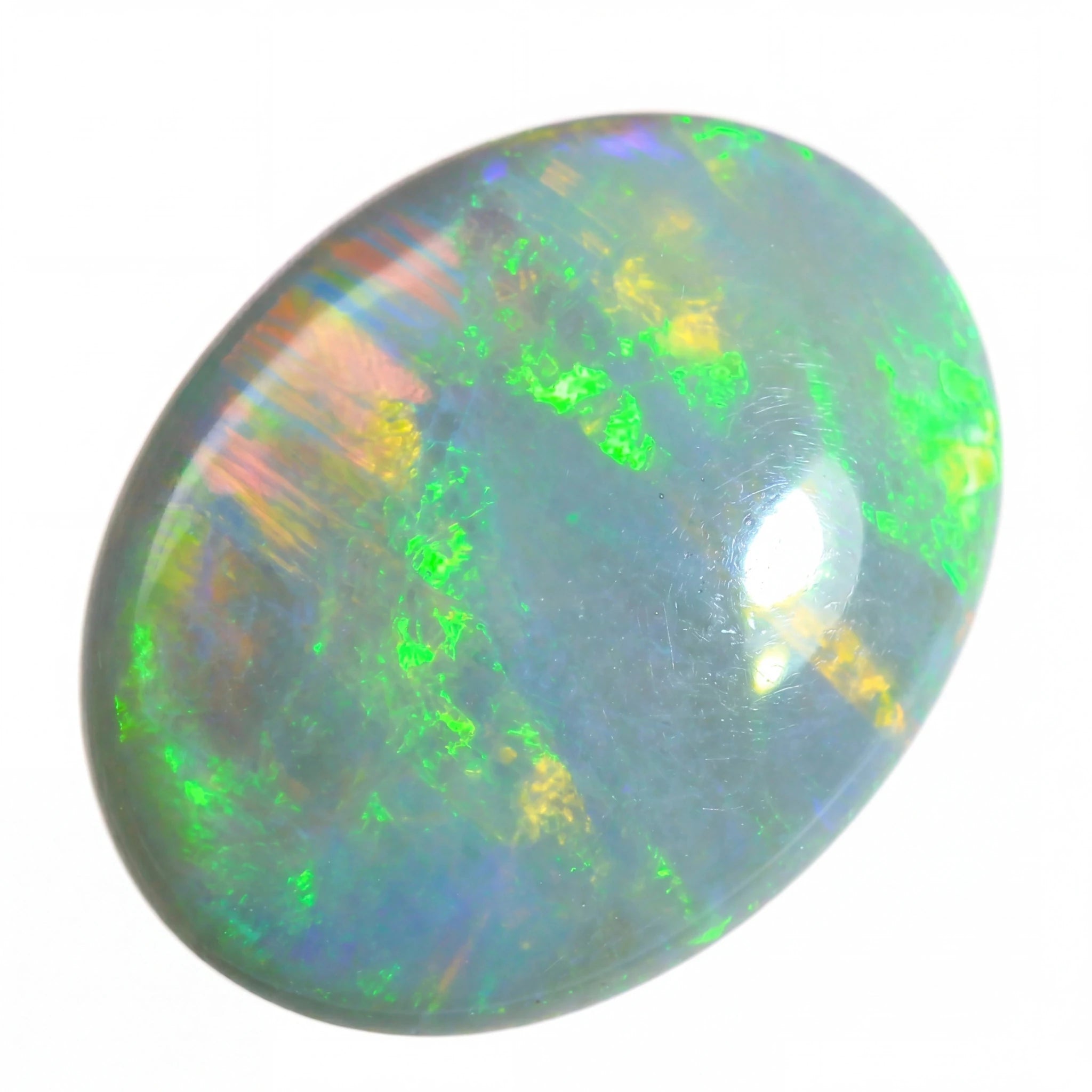 Multicoloured opal stone on a white background