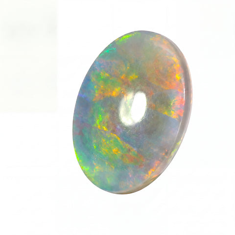 Multicoloured opal stone on a white background