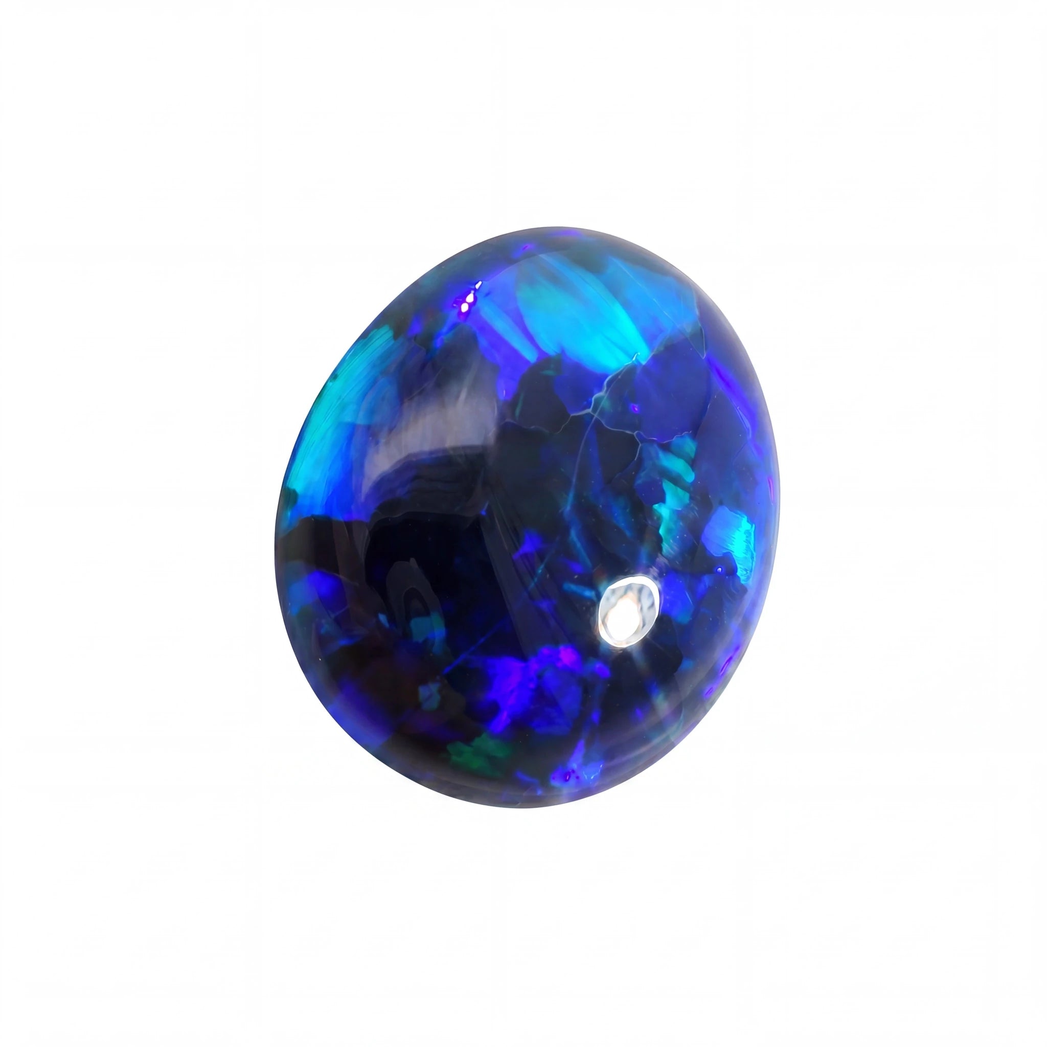 Blue and purple gemstone on a white background