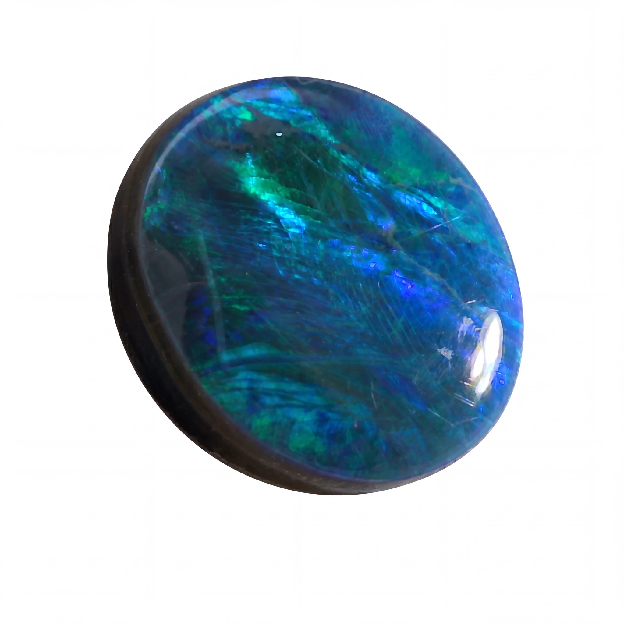 Blue and green gemstone on a white background