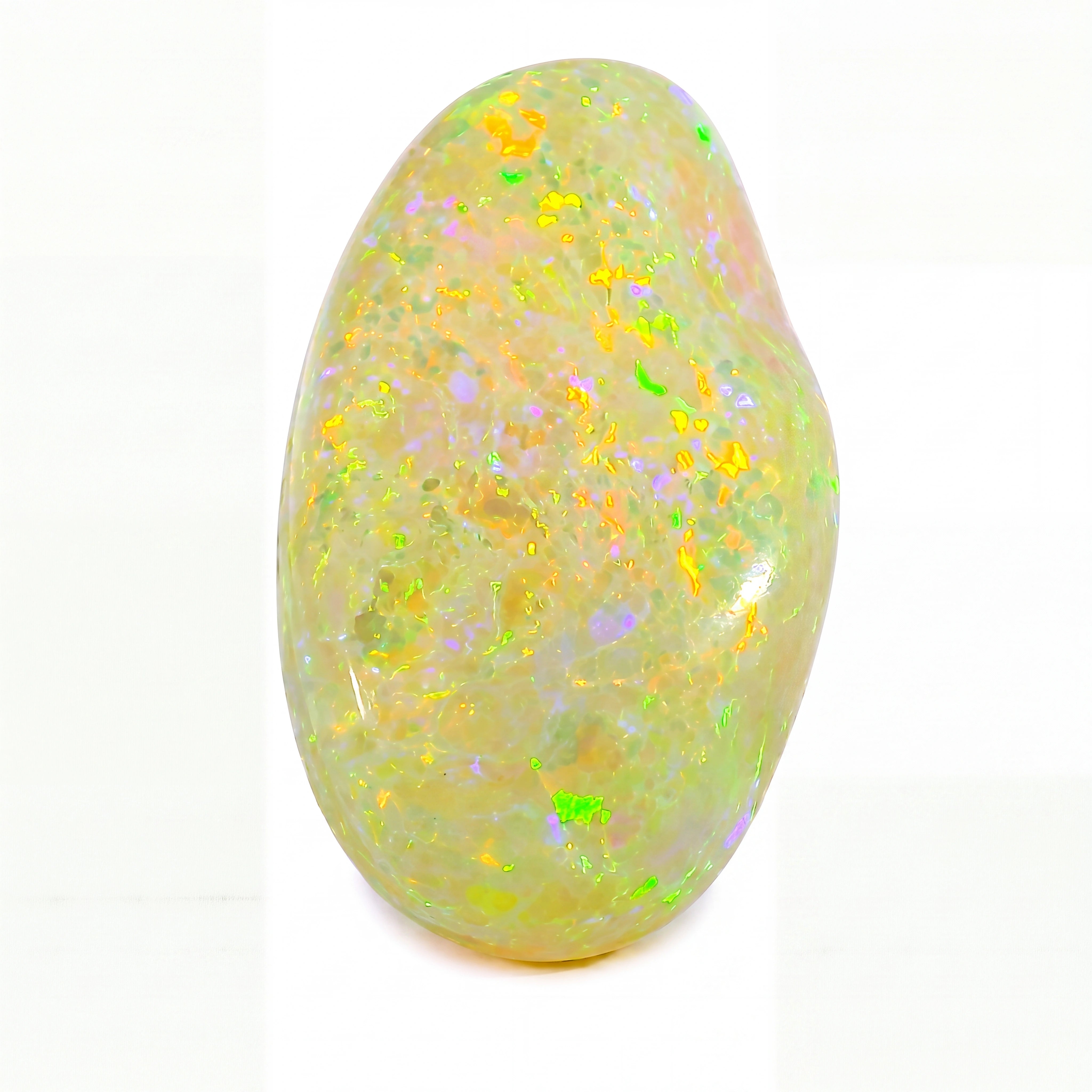 Opal stone with colourful speckles on a white background