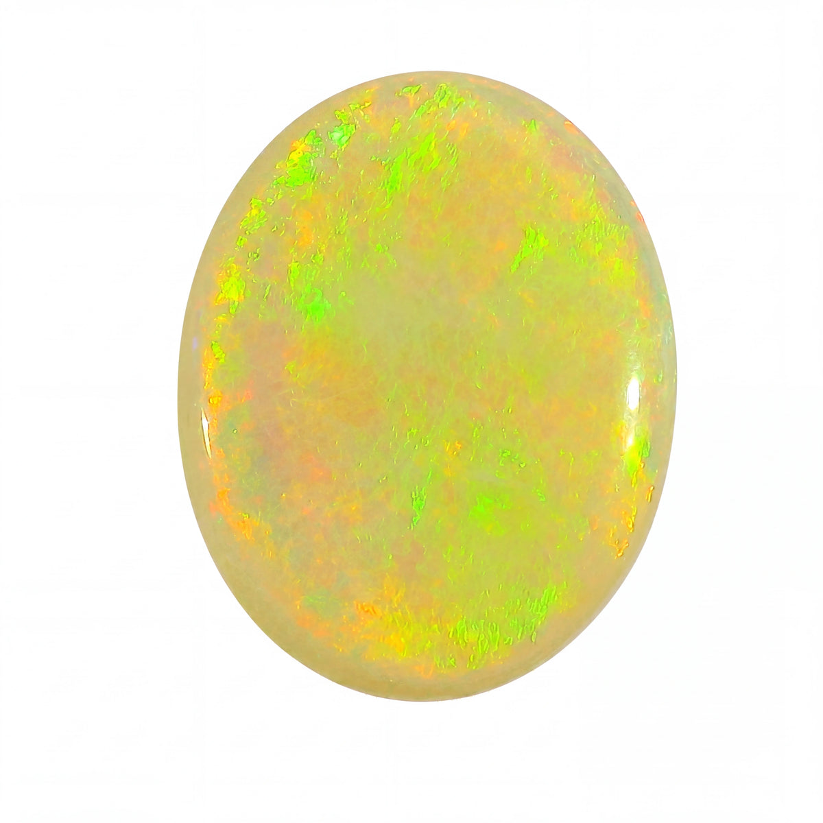 Oval-shaped opal stone with green and yellow fluorescence on a white background