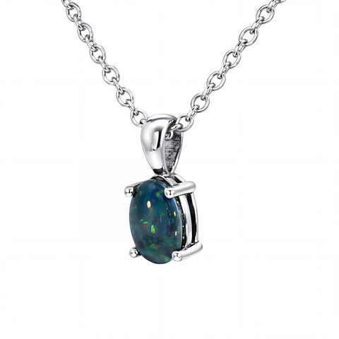 Opal pendant necklace on a white background