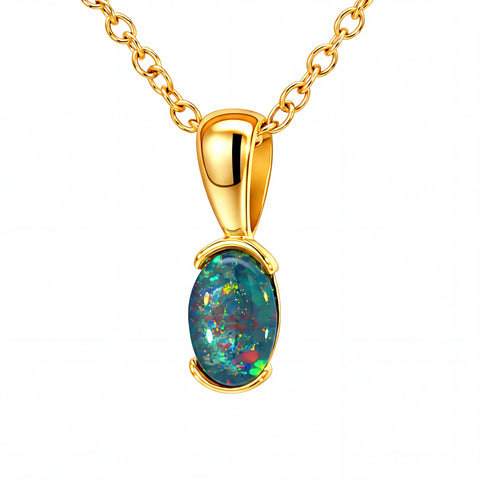 Gold necklace with an opal pendant on a white background