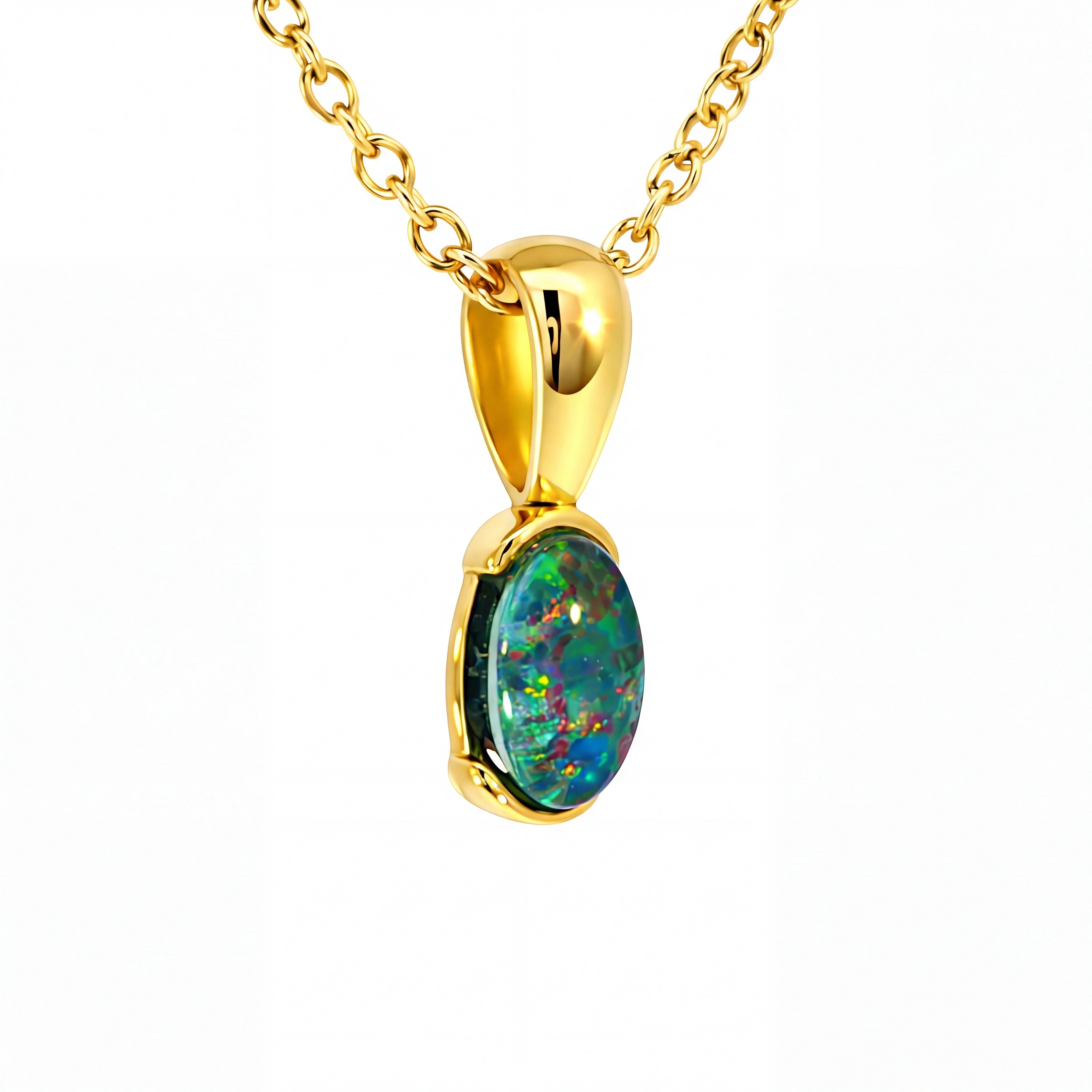Gold pendant with a colourful gemstone on a white background