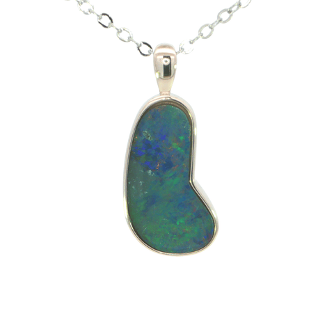 Opal pendant on a silver chain against a white background
