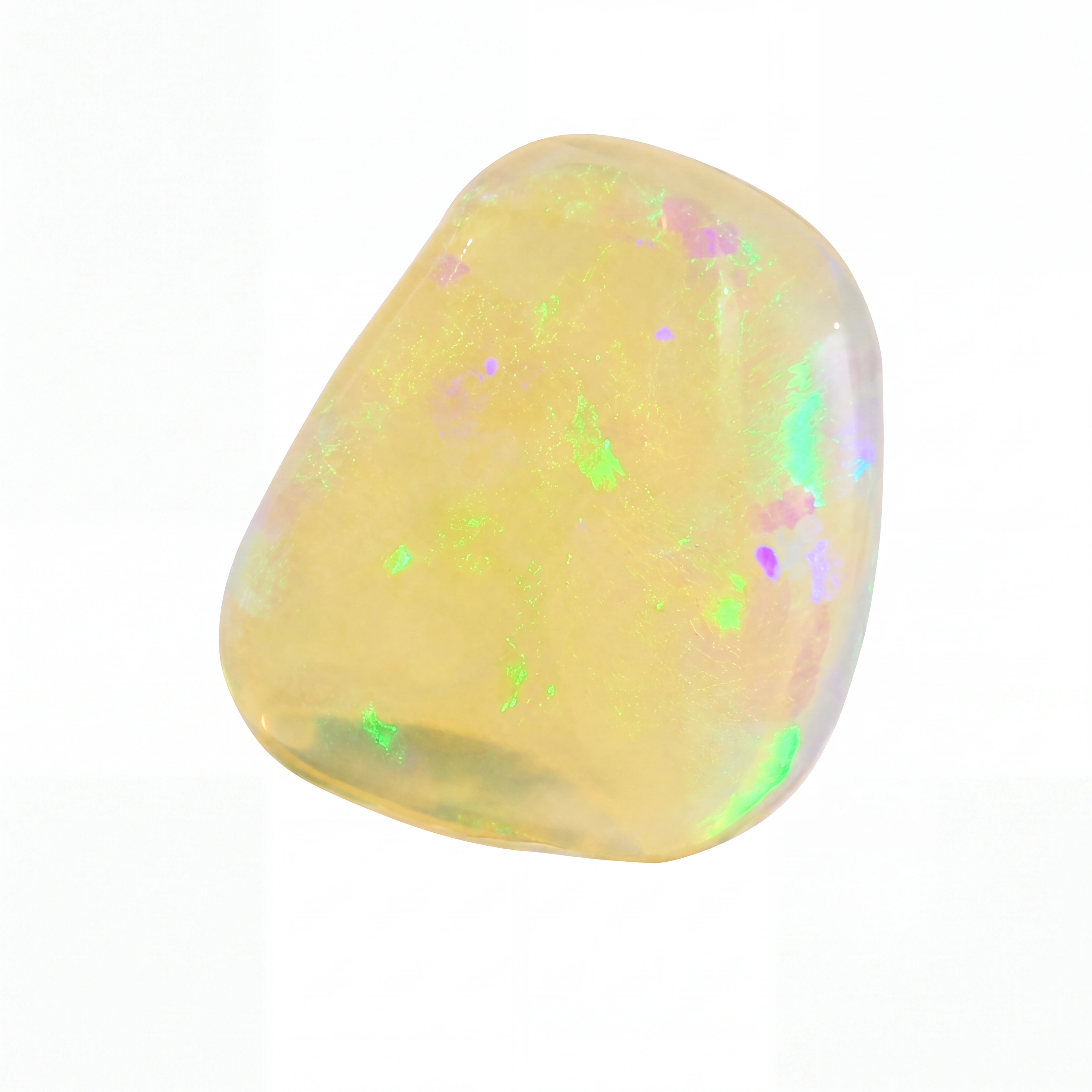 A polished tumbled opal gemstone with a creamy yellow base and vibrant, shifting iridescent flashes of green, pink, and blue, set against a solid white background.
