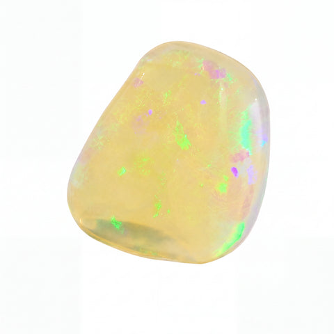 A polished tumbled opal gemstone with a creamy yellow base and vibrant, shifting iridescent flashes of green, pink, and blue, set against a solid white background.