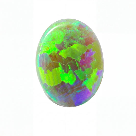 A polished oval cabochon gemstone featuring a vibrant play-of-colour pattern with bright green, purple, blue, and brown patches on a white background.
