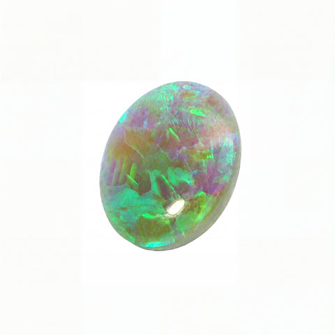 A single oval opal gemstone displaying vibrant iridescent flashes of green, blue, purple, and orange on a solid white background.