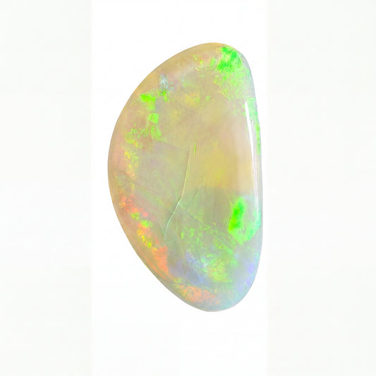 A polished teardrop-shaped opal gemstone displaying vibrant flashes of neon green, orange, and blue over a creamy off-white base, set against a plain white background.