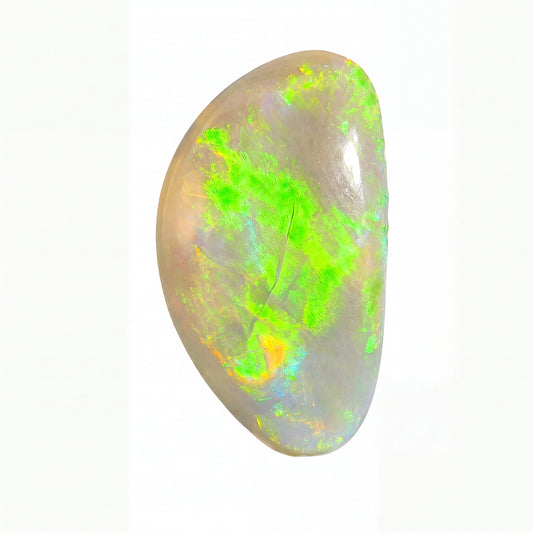 A polished opal gemstone with vibrant green, orange, and blue flashes on a pale greyish-white base, isolated on a white background.