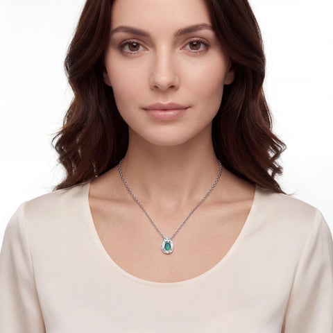 Woman wearing a necklace with a pendant on a white background