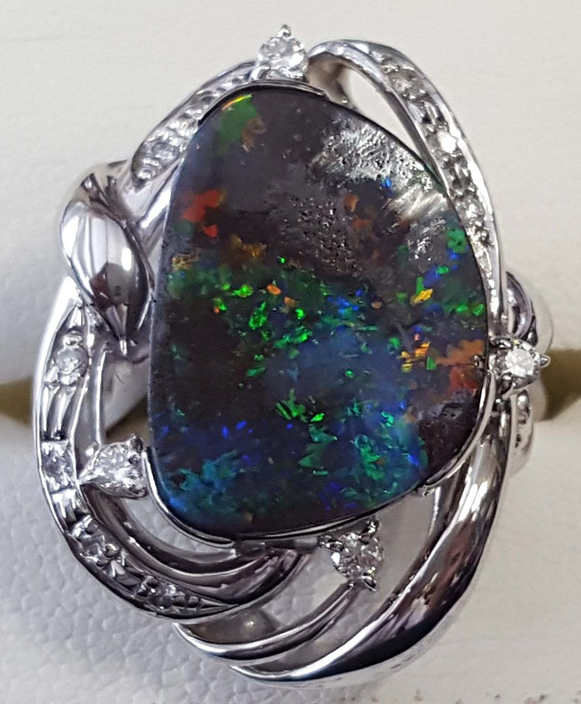 Boulder Opal 7.55Ct Ring set in 18k Platinum PT900 with 15x G-H/Vs1-Si1 Diamonds Weighing 0.190 Carats