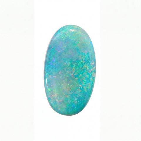 A polished oval cabochon gemstone showing vibrant blue, green, and white opal play, set against a plain white background.