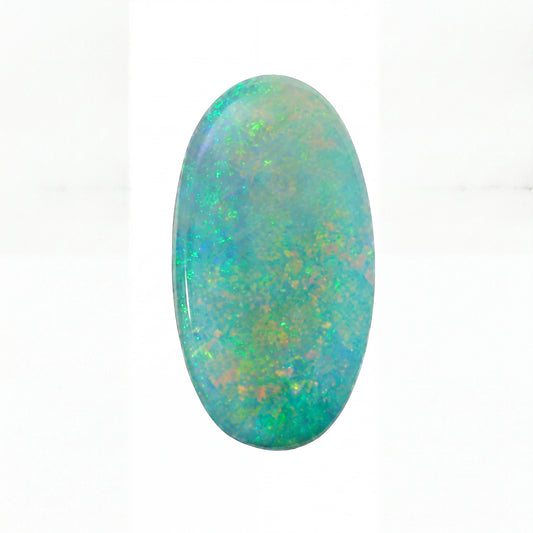 A polished oval cabochon gemstone showing a vibrant play-of-colour with blue, green, and orange iridescence on a white background.