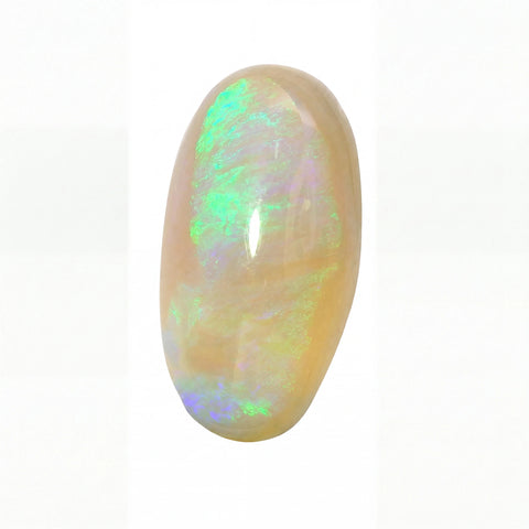 A polished oval cabochon opal gemstone displaying a creamy beige base with vibrant green, blue, and purple iridescent flashes, set against a plain white background.