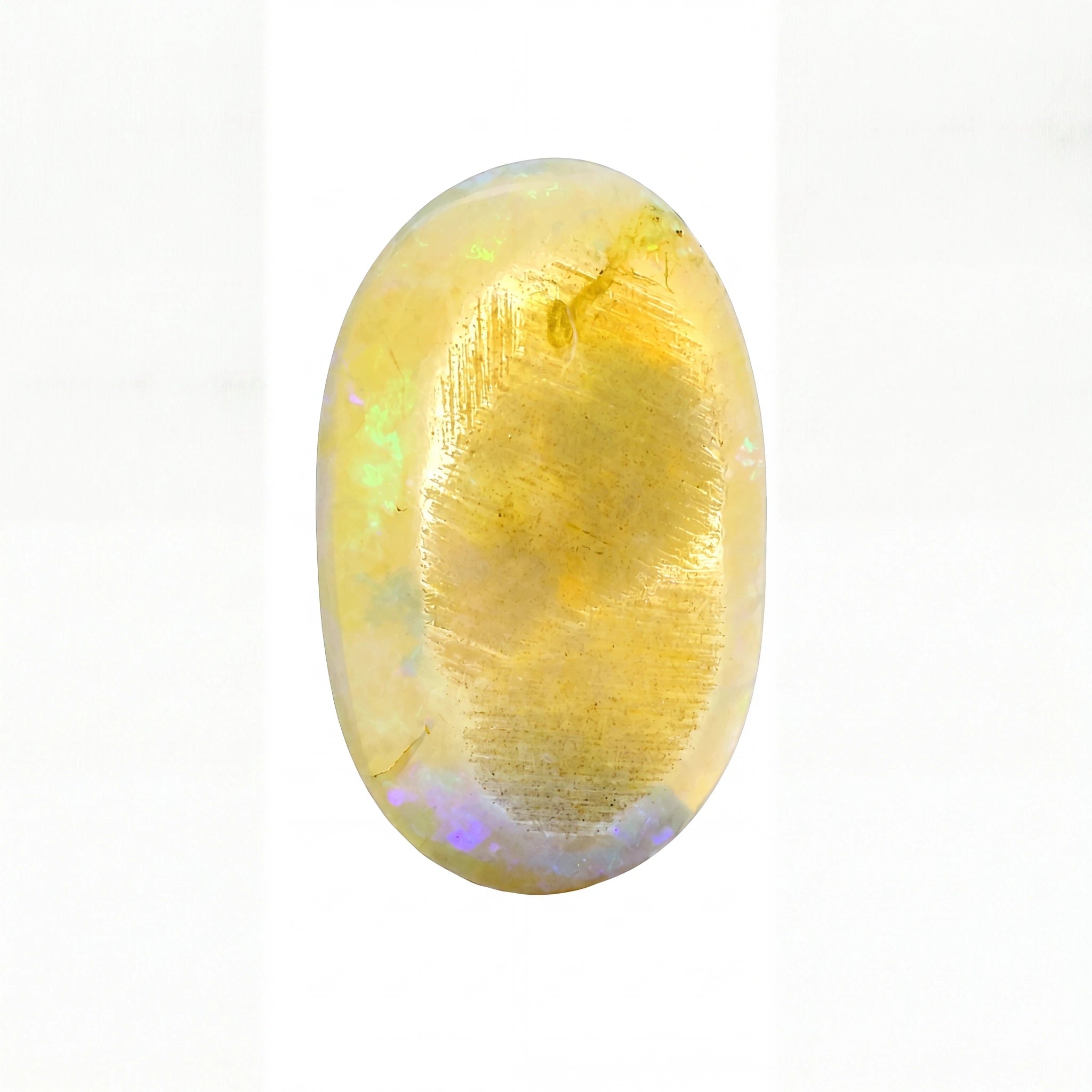 A polished oval cabochon gemstone with a dominant golden-yellow hue and subtle iridescent flashes of green, blue, and purple, set against a plain white background.