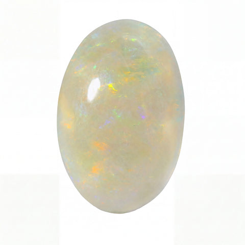 A polished oval cabochon opal gemstone displaying a creamy off-white base with vibrant flashes of orange, yellow, and green iridescence, set against a plain white background.