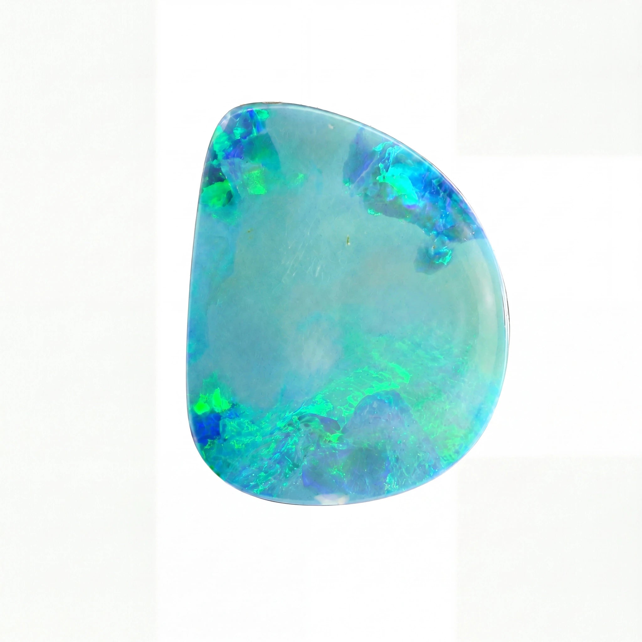Multicoloured opal stone on a white background