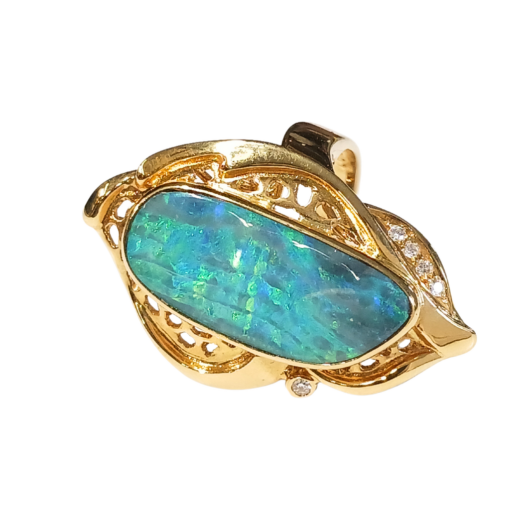 Boulder Opal 6.00 Carats  Ring set in 18 K Yellow Gold with 5x G-H/Vvs-Si1 Diamonds TW 0.400 Carats