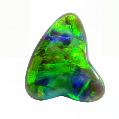 Opal stone with green and blue colours on a white background