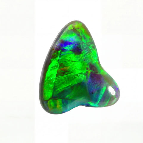 Multicoloured opal stone on a white background