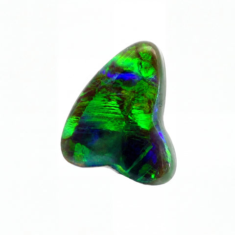 A polished triangular opal stone with vibrant green, blue, and purple iridescent play-of-colour, set against a plain white background.