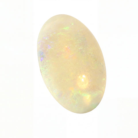A polished oval cabochon gemstone with a milky white base and iridescent flashes of green, orange, and blue, isolated on a white background.