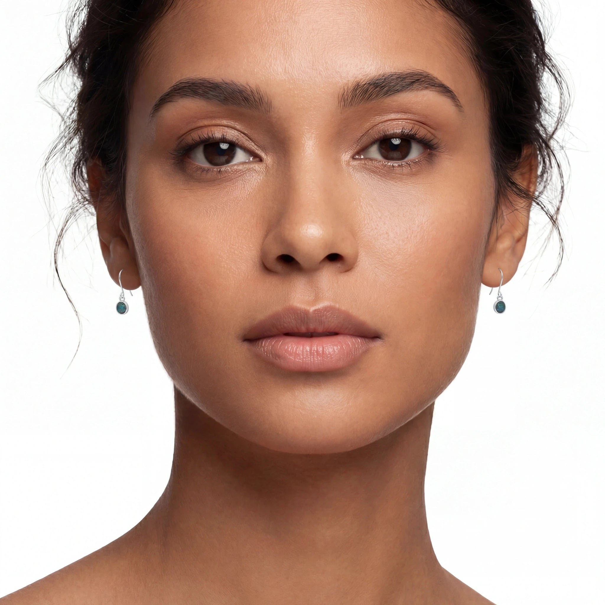 Close-up of a woman's face with a neutral background