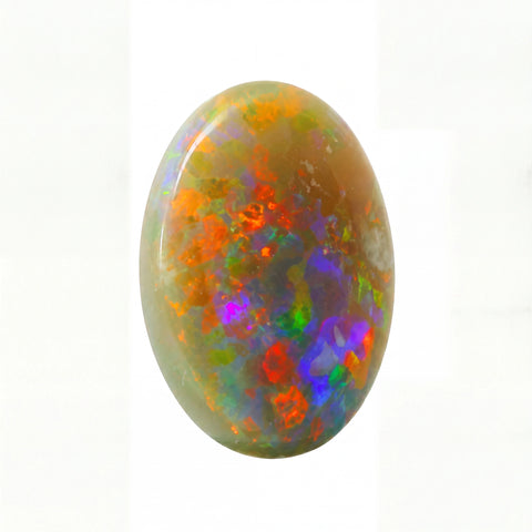 Multicoloured opal stone on a white background