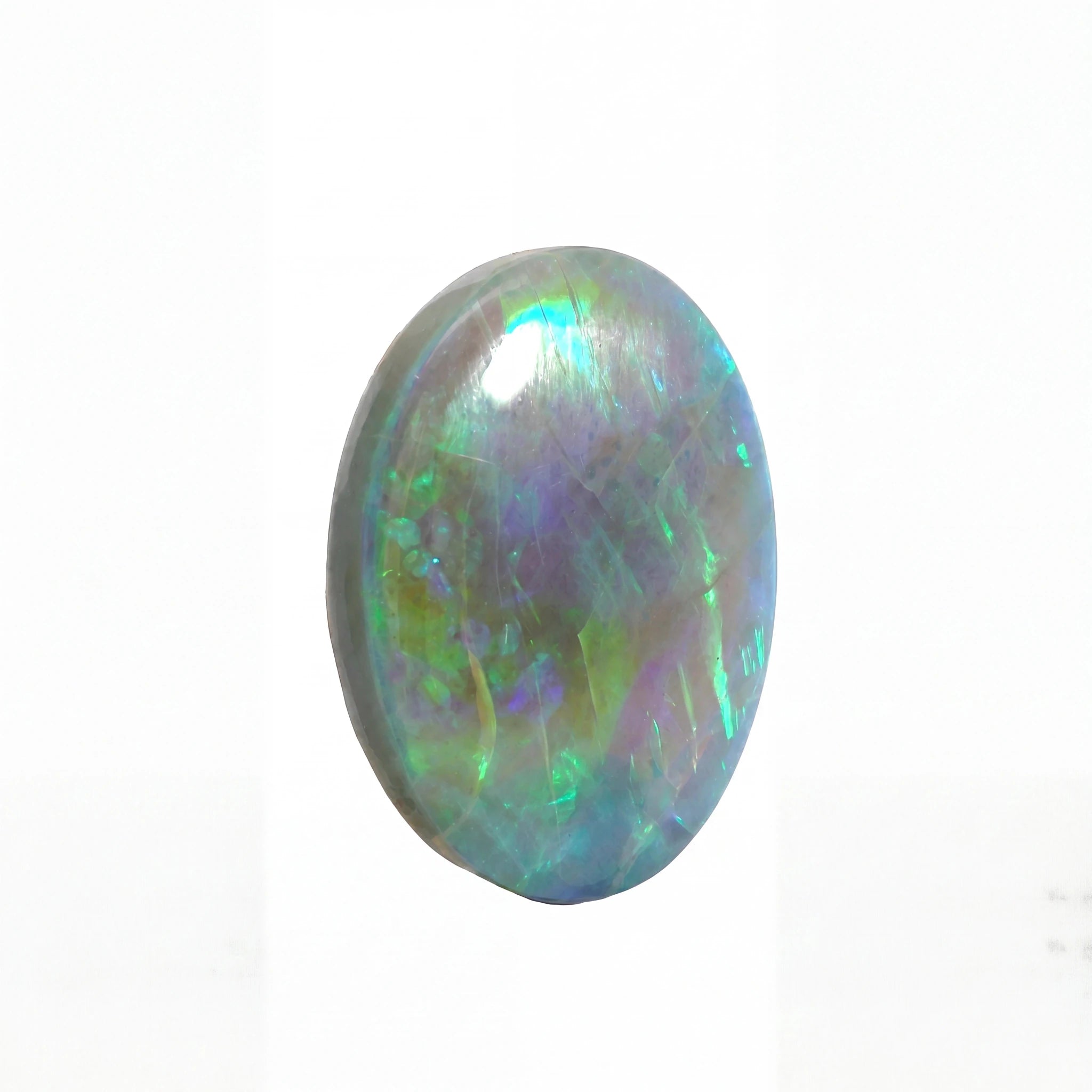 Multicoloured opal stone on a white background