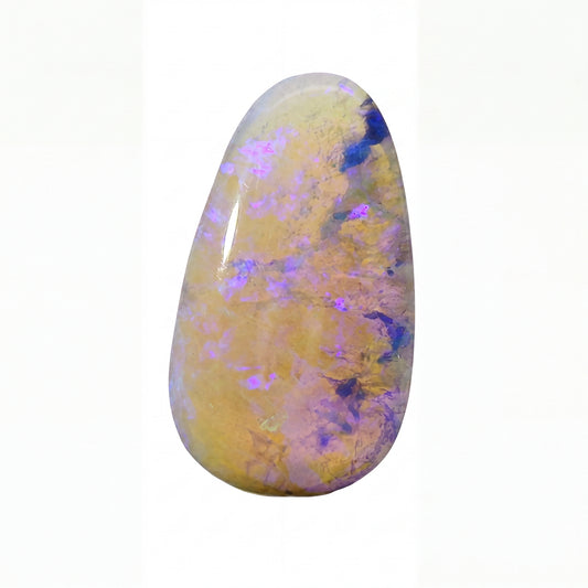 Opal stone with purple and yellow colours on a white background