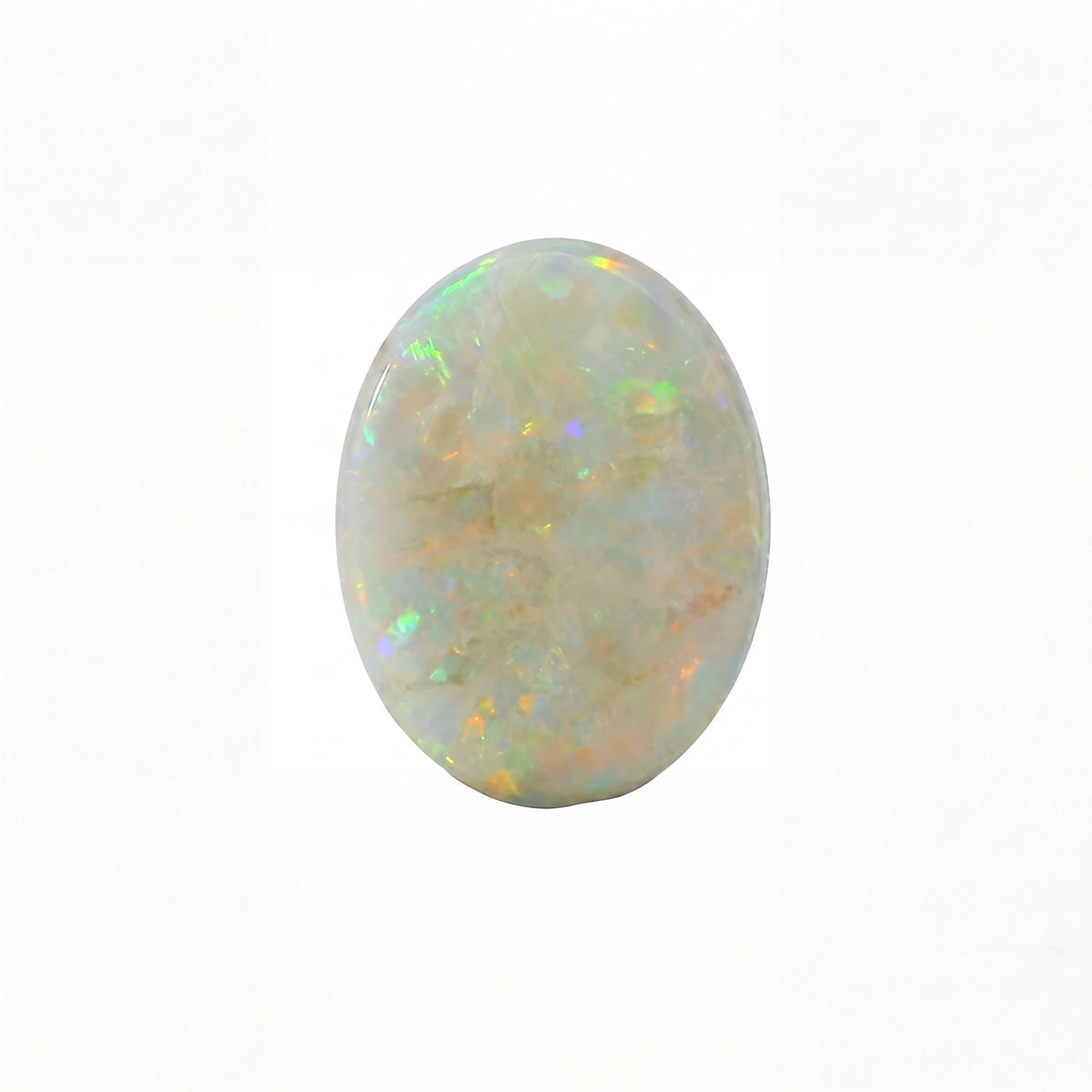 Opal stone with multicoloured play of light on a white background
