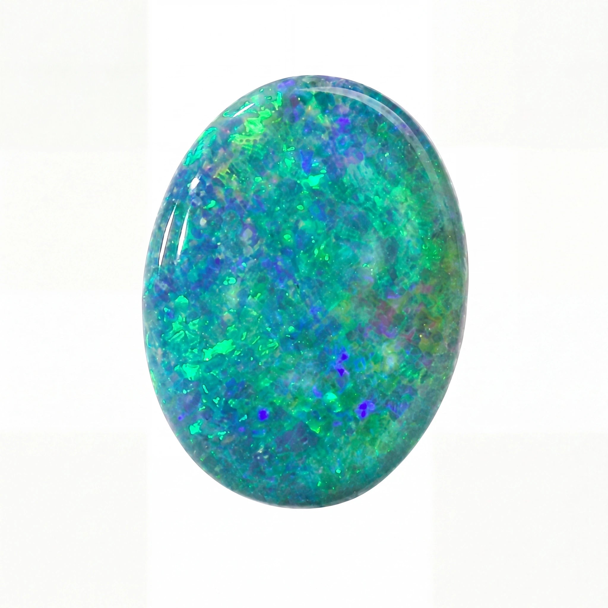 A polished oval cabochon gemstone featuring a vibrant play-of-colour pattern with green, blue, and purple flashes on a white background.