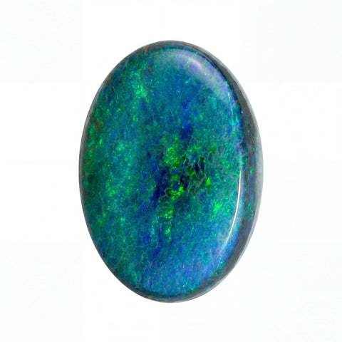 Oval-shaped opal stone with blue and green colours on a white background