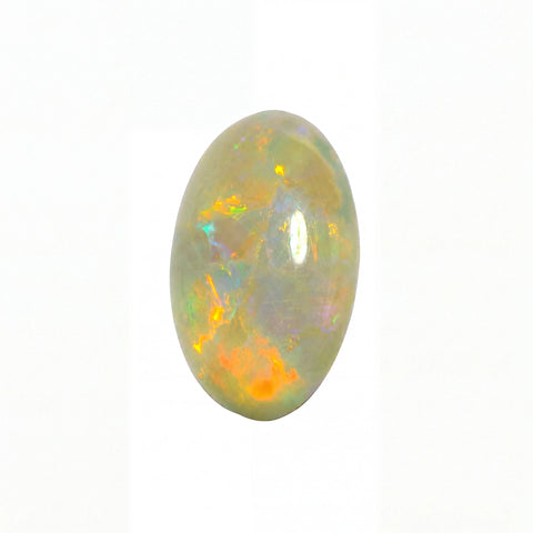 Opal stone with multicoloured play of light on a white background