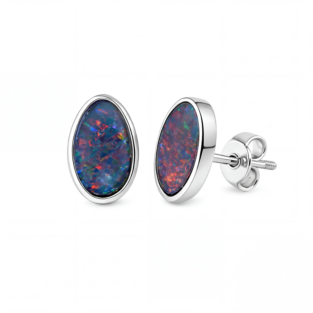 Pair of silver earrings with multicoloured gemstones on a white background