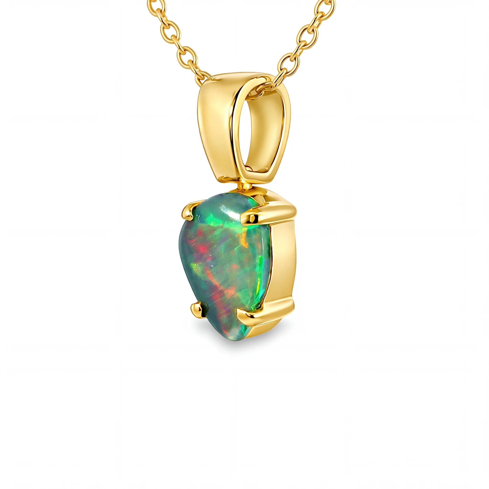 Gold pendant with a heart-shaped opal stone on a white background