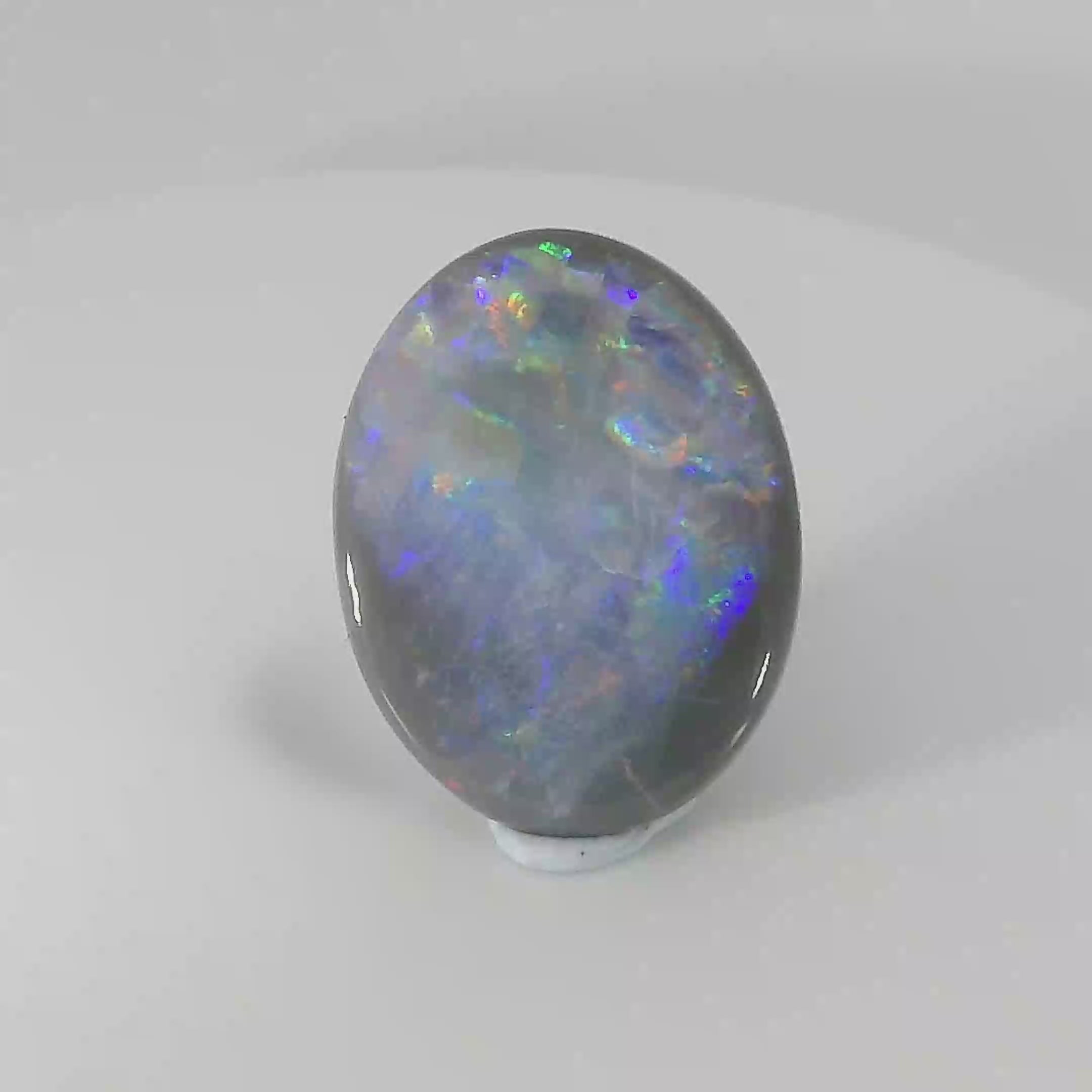 Captivating Opal Gemstone in Hand