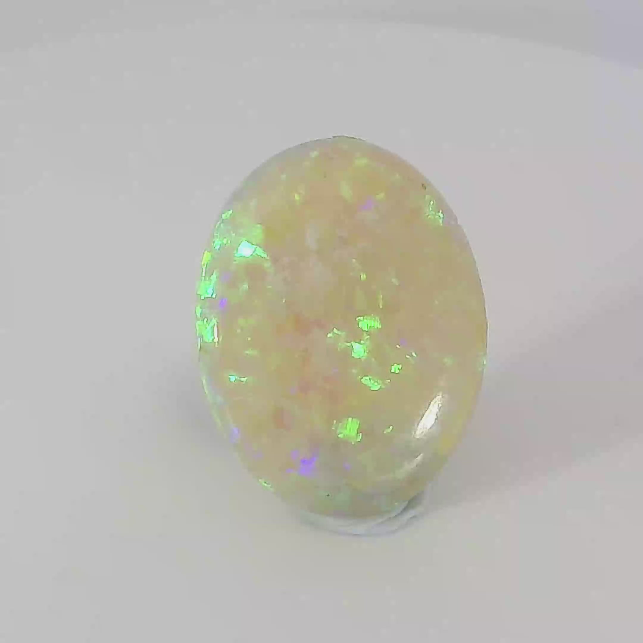 Captivating Opal Gemstone in Hand