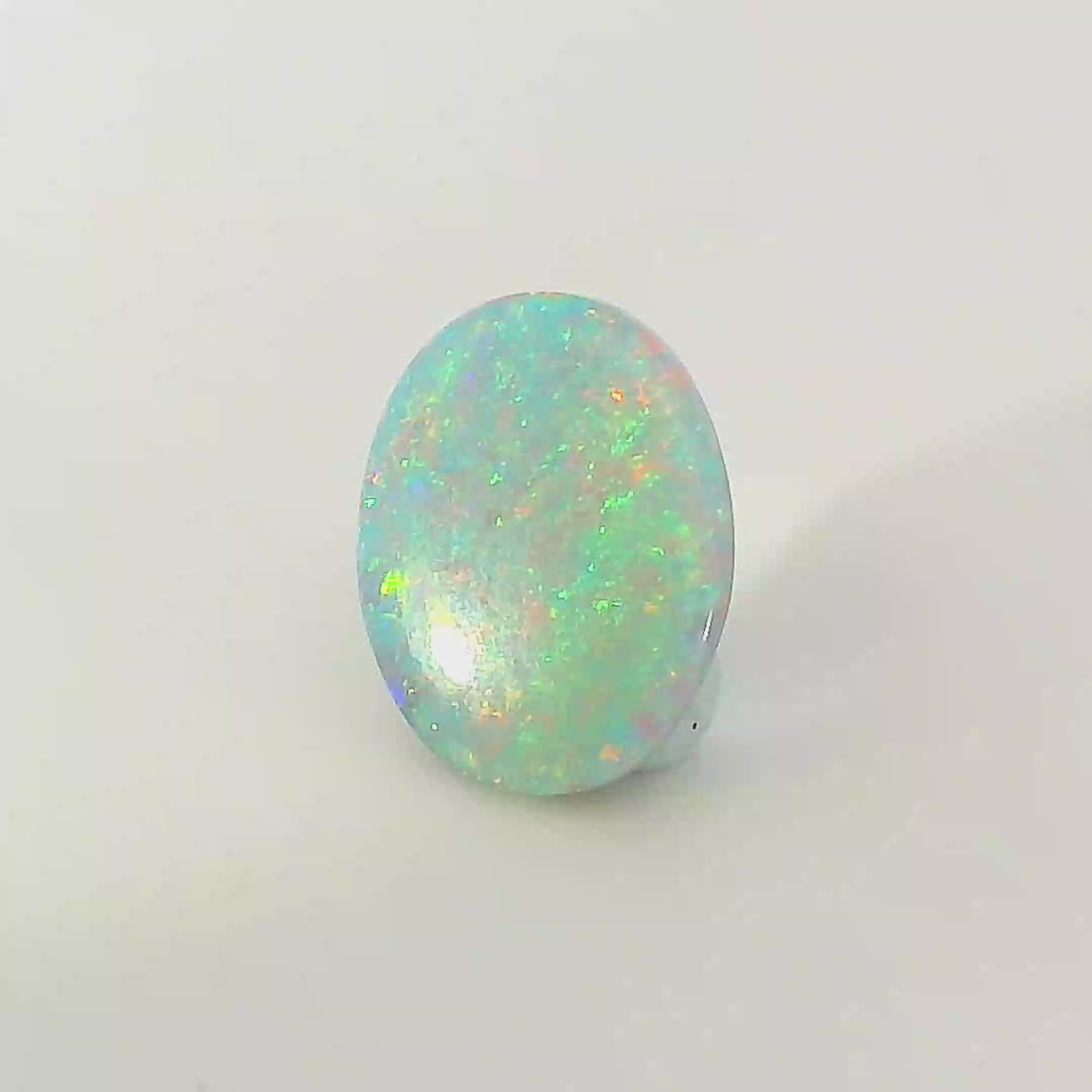 Vibrant Opal Gemstone in Hand