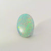 Vibrant Opal Gemstone in Hand