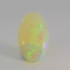 Vibrant Opal Gemstone in Hand
