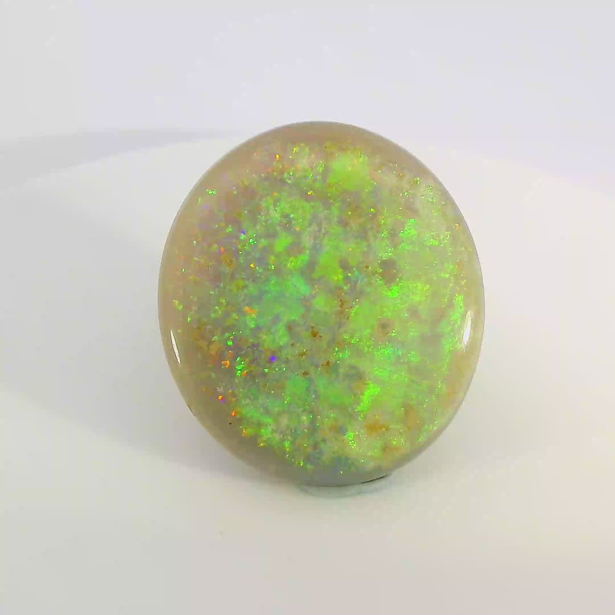 Vibrant Opal Gemstone in Hand