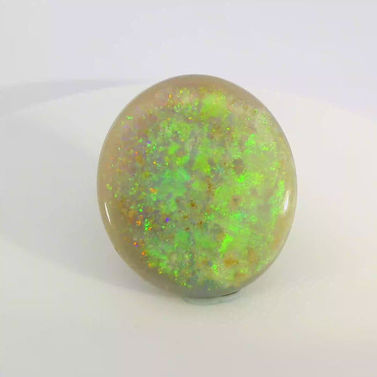Video of an Round opal stone with green and yellow fluorescence